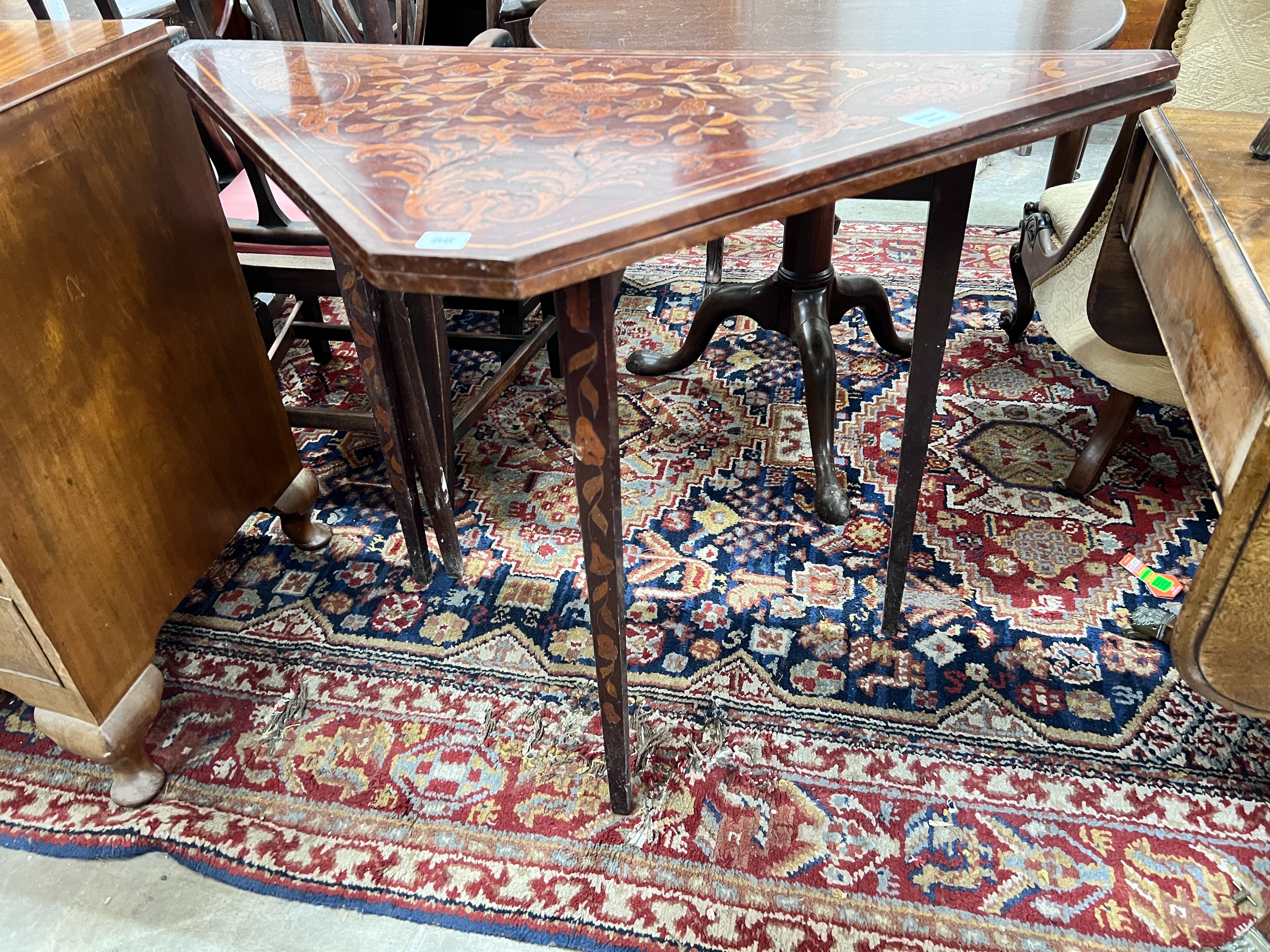 A 19th century Dutch mahogany and floral marquetry inlaid walnut folding card table, width 104cm, depth 52cm, height 77cm *Please note the sale commences at 9am.
